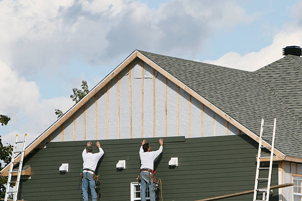 Professional Storm Damage Siding Repair technician working in Spring Church, PA